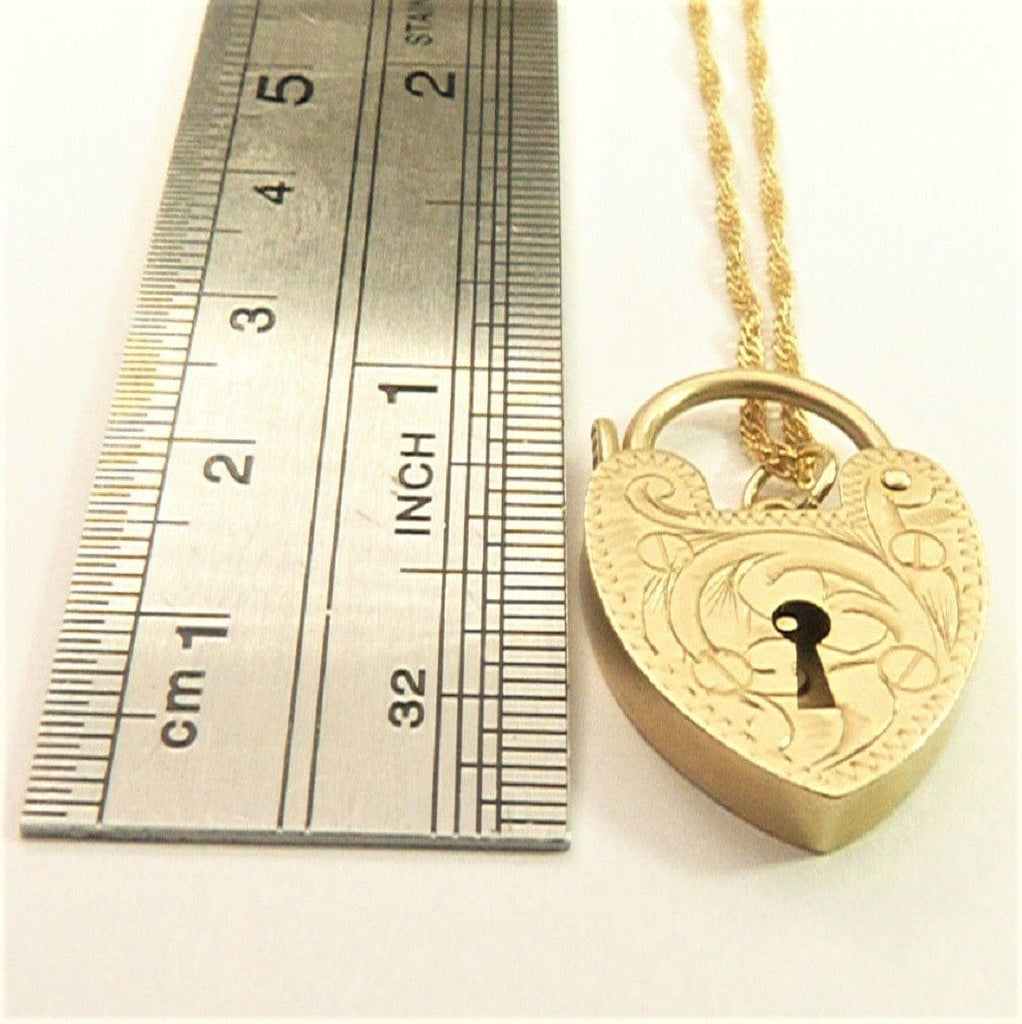 Engraved Gold Heart Pendant On Necklace
