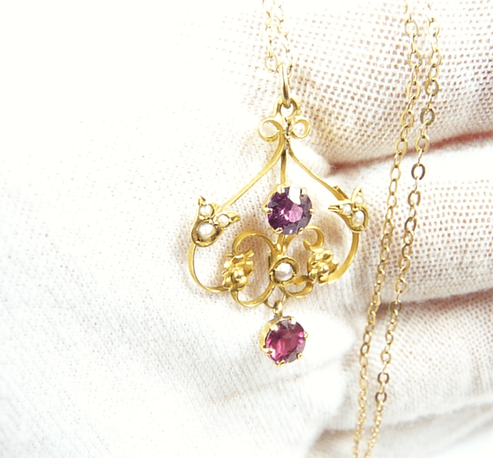 Hallmarked Gold Garnet And Seed Pearl Pendant.
