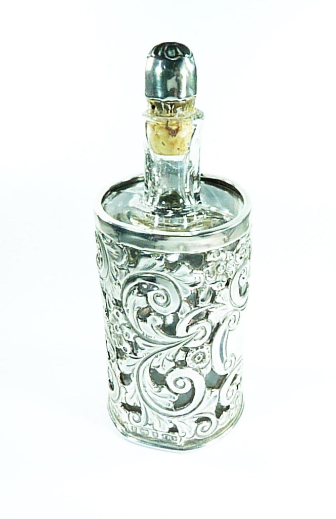 Silver And Glass Perfume Bottle