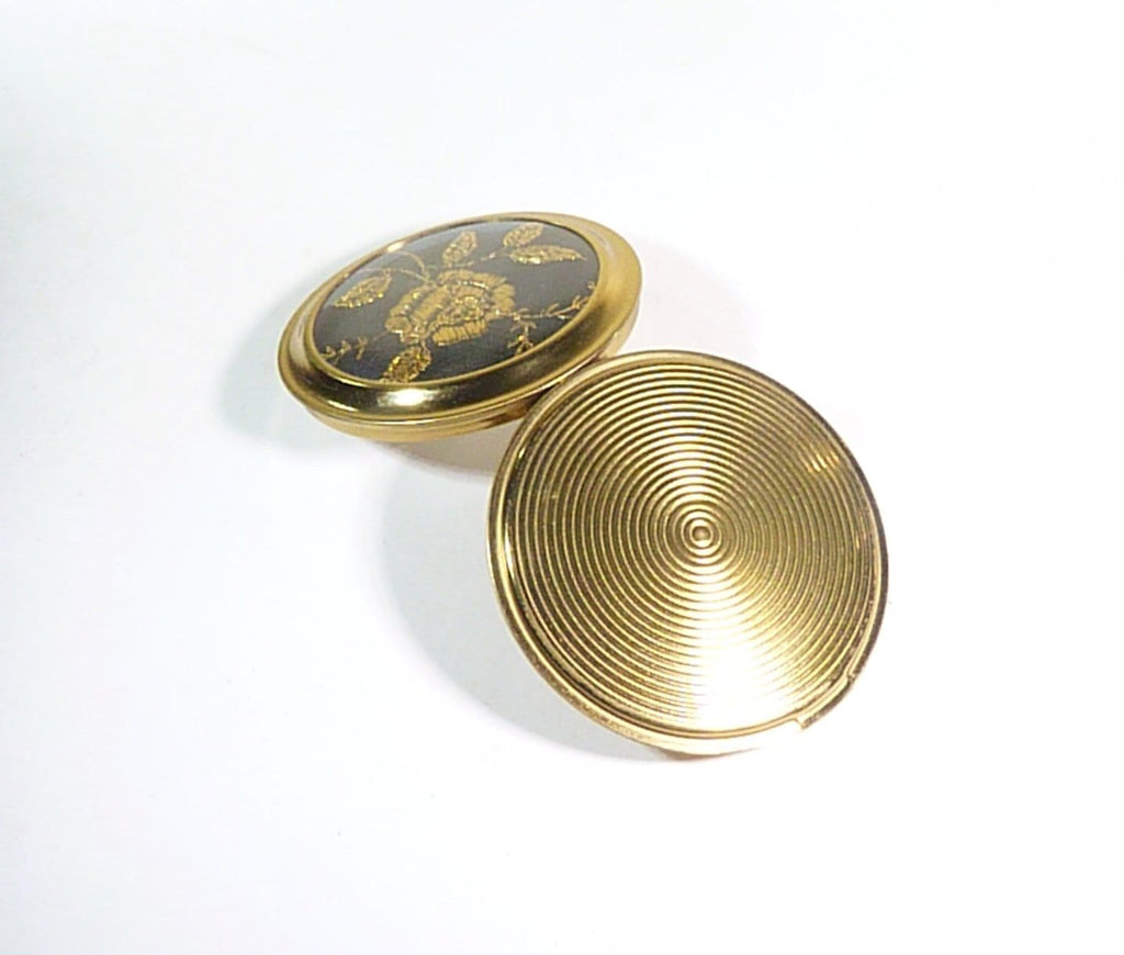black and gold rose vintage compact