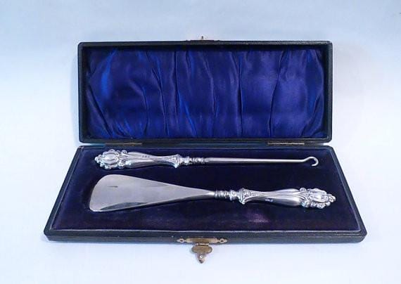 Edwardian silver shoe horn and button hook repoussage